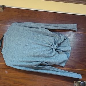 A mock neck sweater